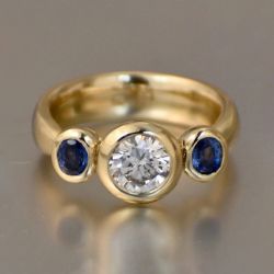 Bezel Round & Oval Cut White & Blue Sapphire Three Stone Engagement Ring