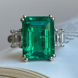 Three Stone Emerald Cut Emerald Color Engagement Ring