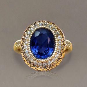 Vintage Golden Halo Blue Sapphire Oval Cut Engagement Ring