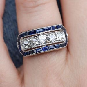 Vintage Halo Blue & White Sapphire Round & Baguette Cut Engagement Ring