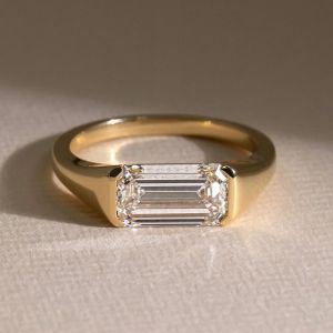 Classic Bezel Setting Emerald Cut White Sapphire Engagement Ring